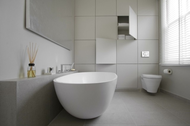 baño de diseño tina marmol blanco minimalista armarios pared