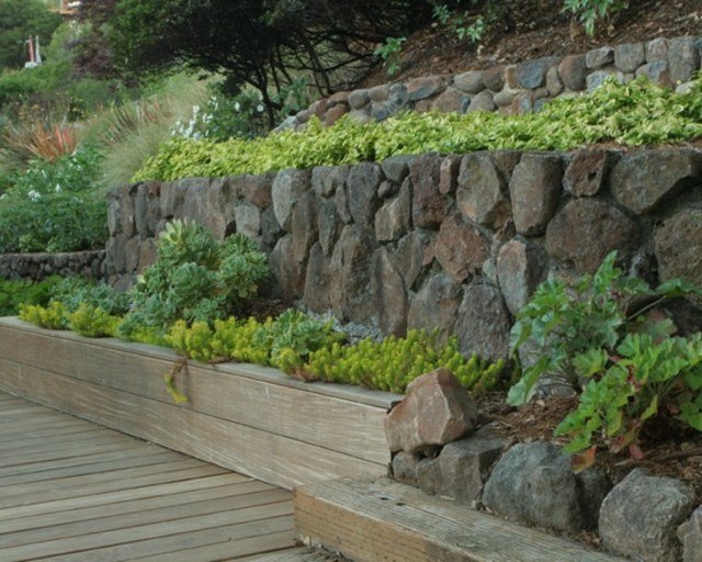 diseño de jardines piedras madera terraza plantas