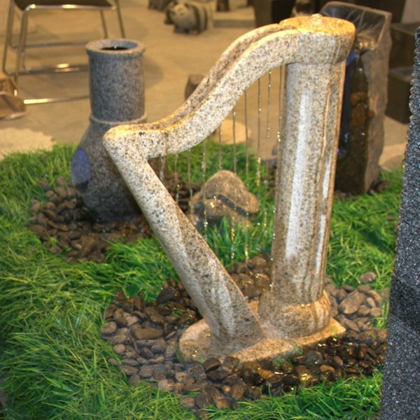 estupenda arpa fuente piedra decoración