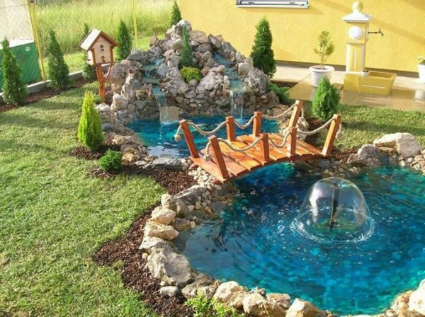 fuente jardín estanque azul puente