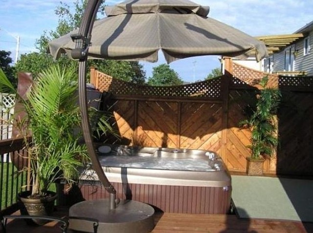 jardin trasero jacuzzi proteccion sol