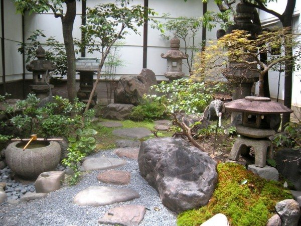 jardín oriental meditación fuente piedras