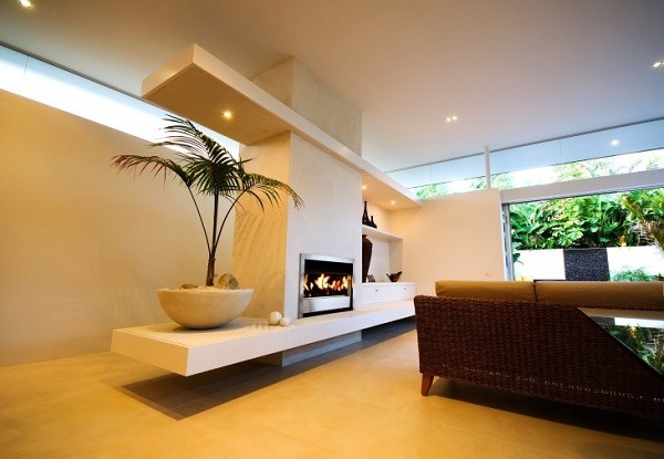 muebles salón chimenea beige planta