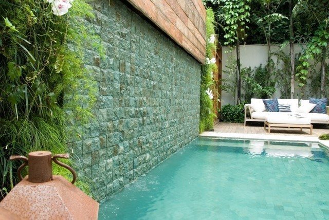 pared piscina decoracion adoquines plantas preciosa