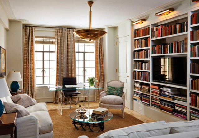 salon precioso comodo estanterias libros mesa cristal idea interesante diseño