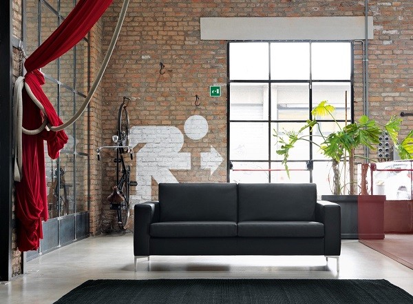 salón moderno sofá negro exit