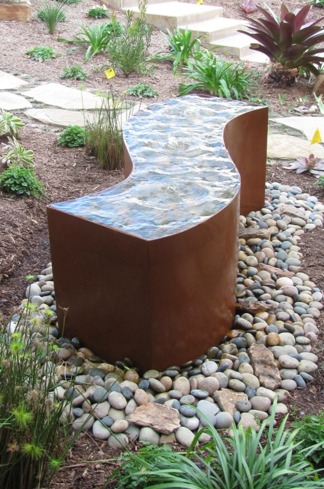acero agua rocas jardin plnatas moderno