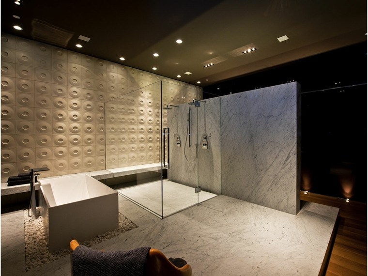 baño moderno pared circulos mármol