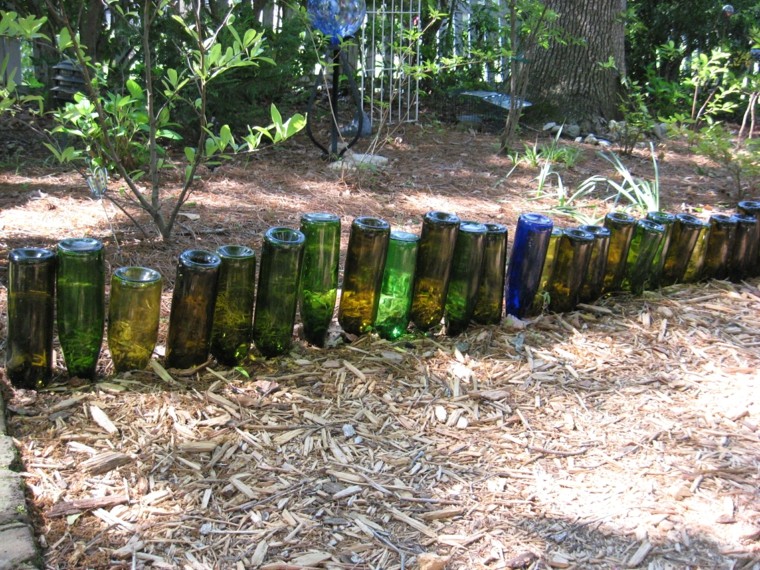 borde valla botellas cristal verdes