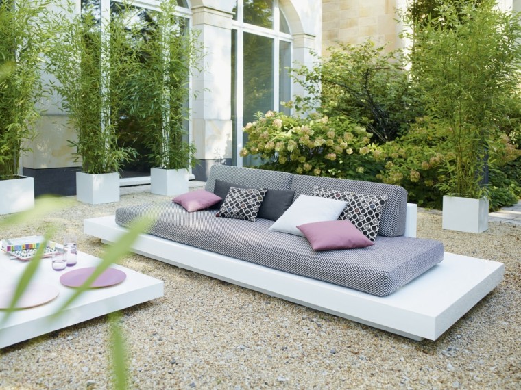 muebles modernos blanco cojines rosas flores maceta moderno