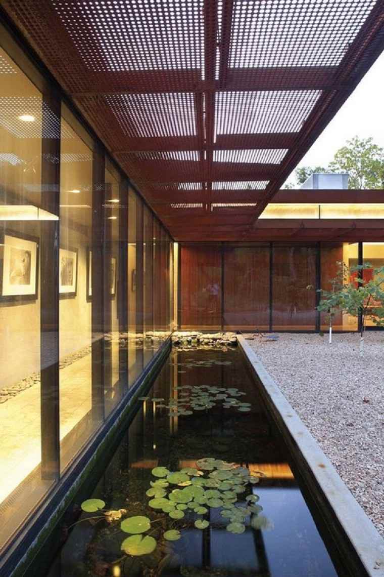 patio moderno loto estanque grava