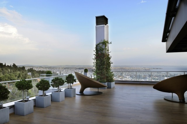 sillas interesantes macetas terraza helechos moderna 