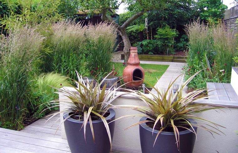diseño de jardines modernos macetas escultura patio