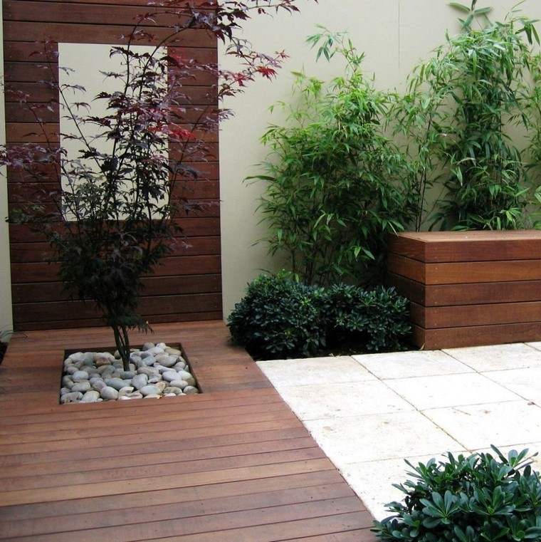 diseño de jardines modernos madera rocas pared