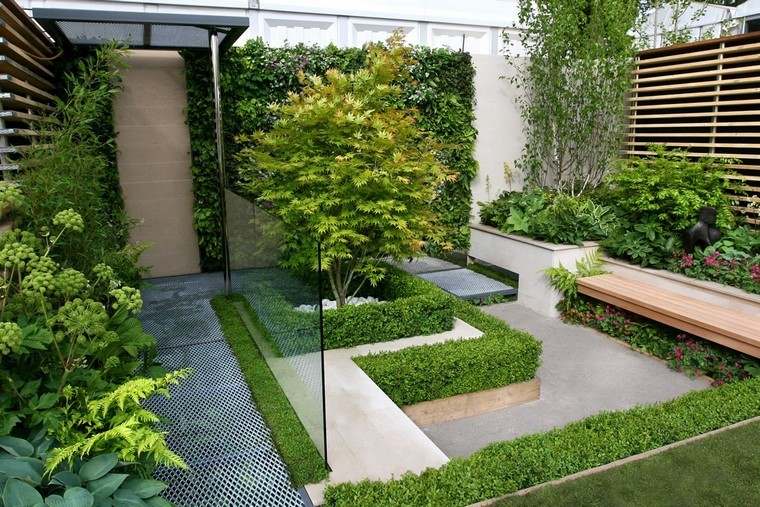 diseño de jardines modernos plantas verdes banca