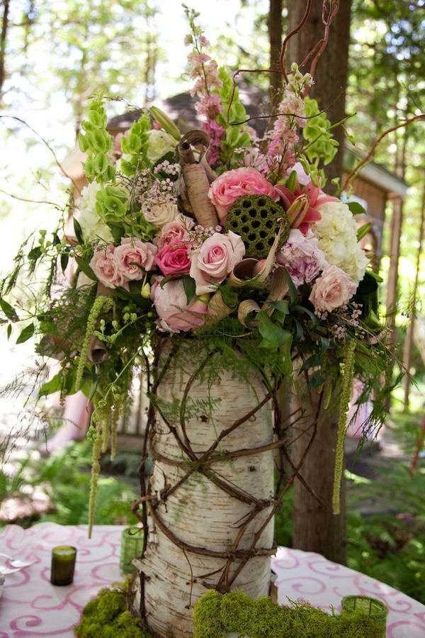 gran jarron tronco arbol rosas