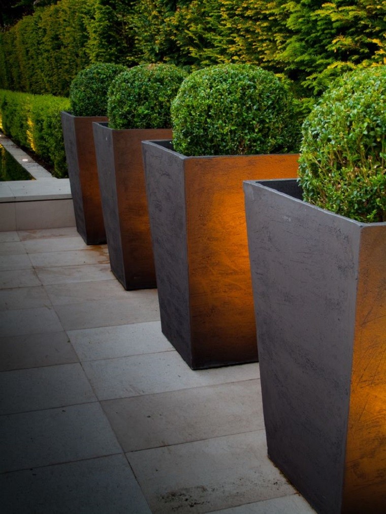 iluminados maceteros metal textura calido