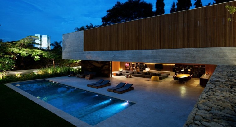 casa noche luces piscina moderna