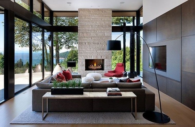 chimeneas modernas salon sofa grande sillon rojo ideas