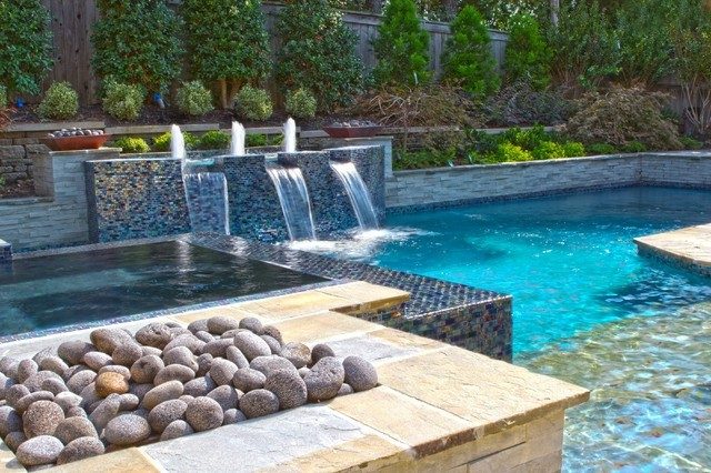 diseño piscina fuente piedras