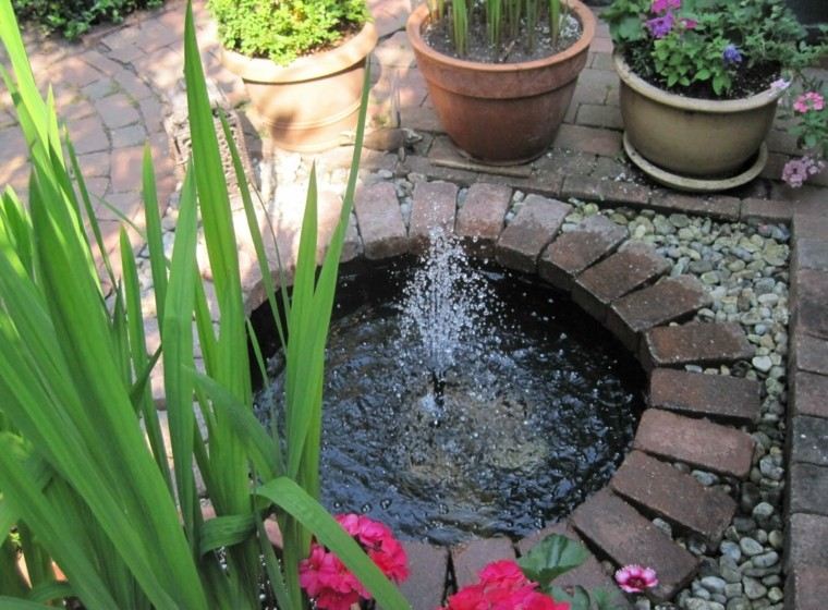 fuente agua redonda obra flores