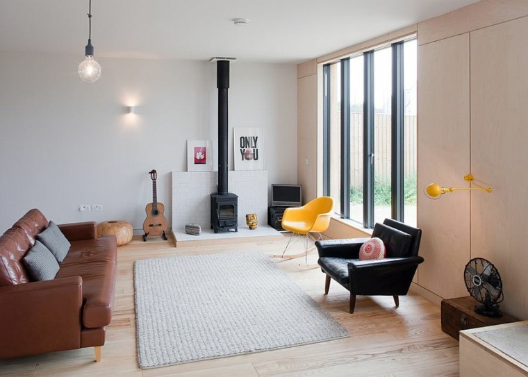 muebles de cuero en el salón con diseño escandinavo salones de diseño escandinavo amplio sofa cuero ideas