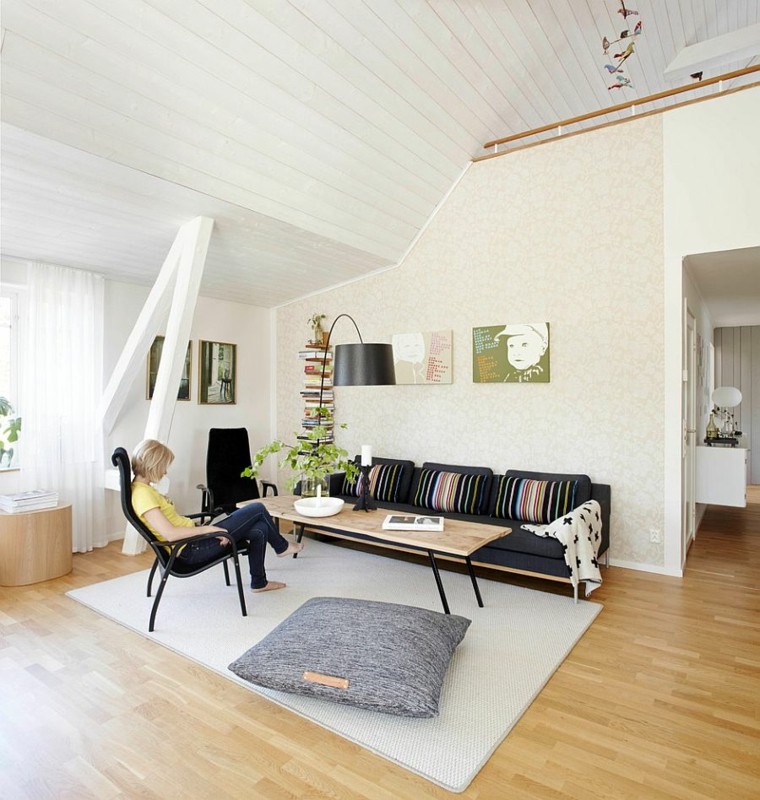 cojín grande gris en el salón con diseño escandinavo salones de diseño escandinavo cojin grande ideas