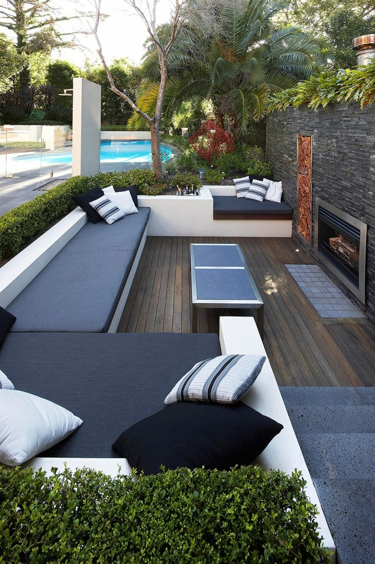 sofá de hormigón con cojines azules en el jardín sofas jardín hormigon color azul modernas ideas