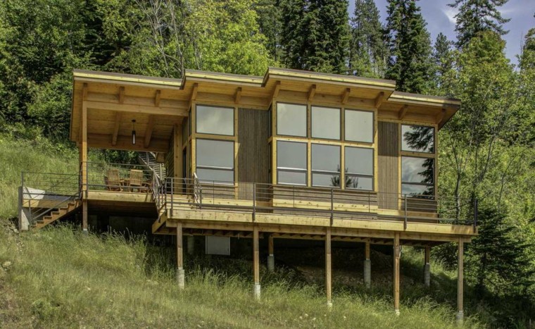 cabaña moderna madera flotante montaña