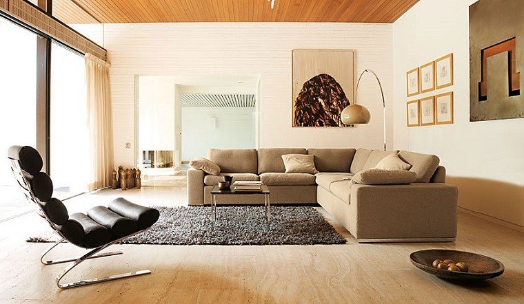 colores calidos salon moderno sofa beige sillon negro ideas
