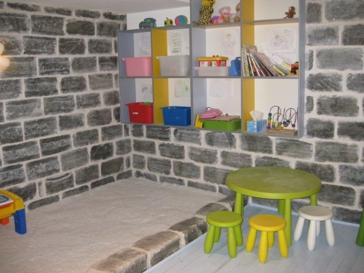 diseño habitaciones infantiles ladrillo arena juego