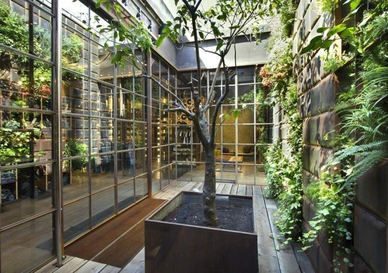 diseño jardines verticales techo ramas