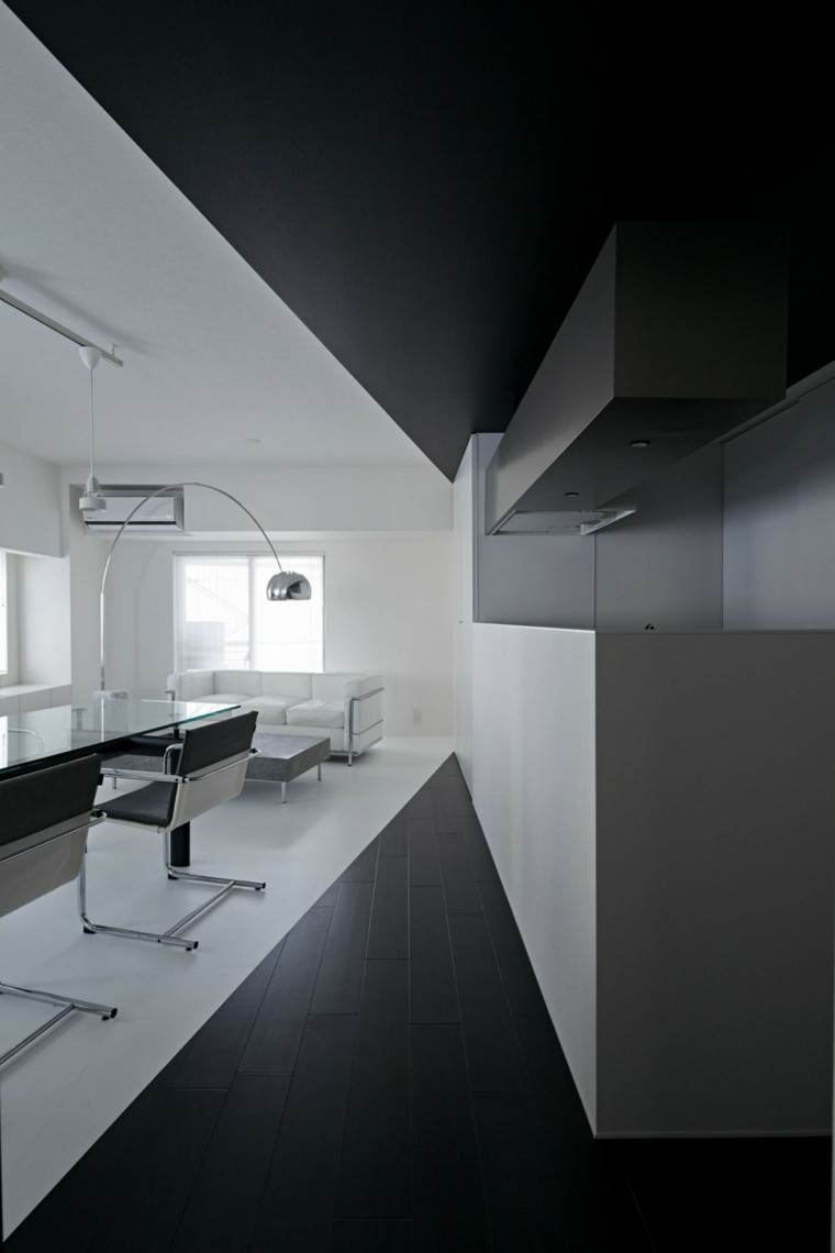 sofá pequeña blanca en el salón moderno blanco y negro combinacion salon moderno losas negras ideas