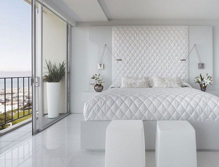 cabecero cama dormitorio moderno taburetes blancos ideas
