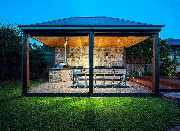 cocina en el jardín moderno protegida por pérgola el refugio perfecto verano cocina exterior exclusiva amplia ideas