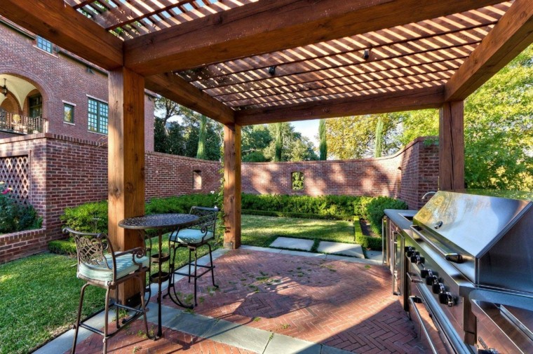cocina y mesa y sillas de acero en el jardín moderno refugio perfecto verano cocina exterior mesa mesa sillas acero ideas