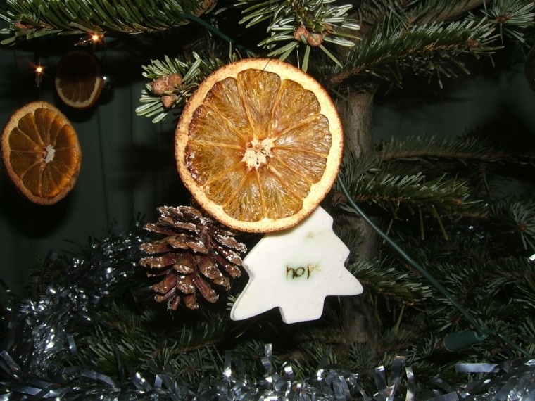 festive orange and pine cone decorations