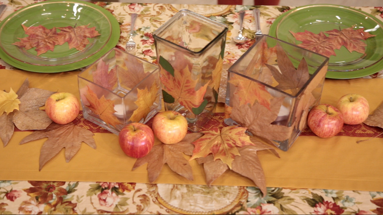 centros de mesa originales ideas manzanas hojas velas candelabros