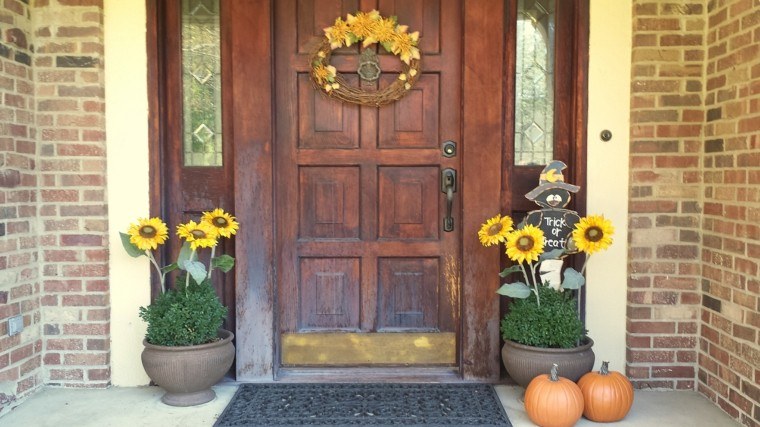puerta madera girasoles otoño
