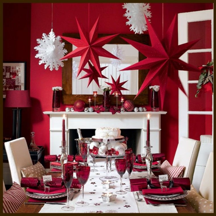 estrellas de navidad decorando casa rojas mesa ideas