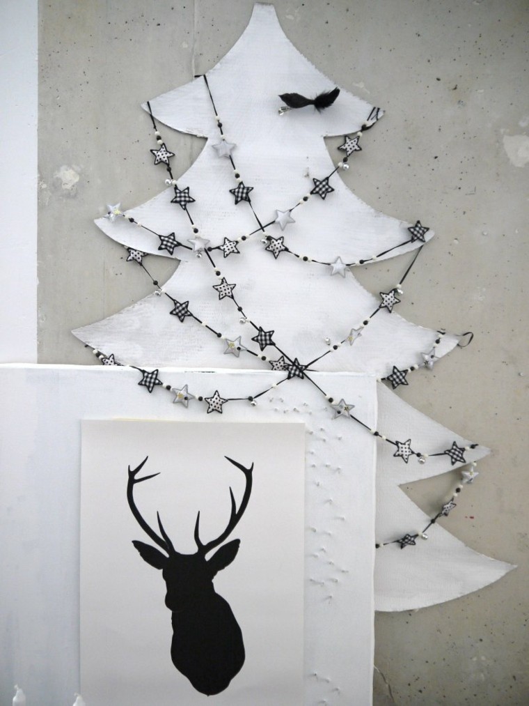 estrellas navidad guirnalda decorando arbol madera ideas