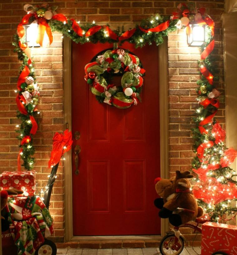 porche puerta de entrada decoracion navidena lazos rojos ideas