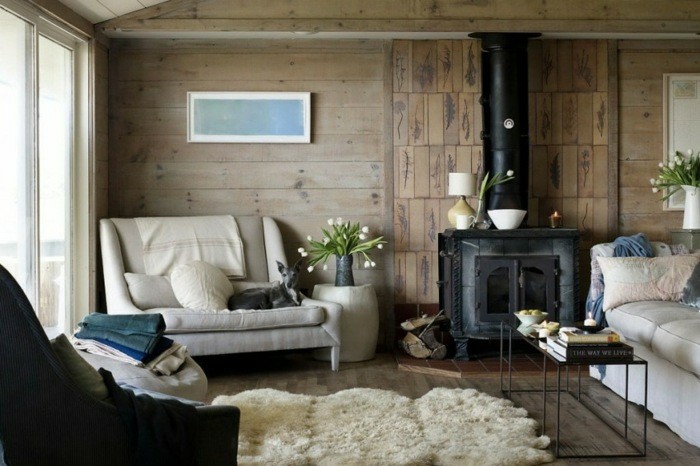 cabaña madera perro sofa pared