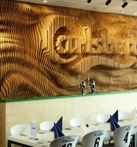 Carlsberg, diseñando una pared con estilo y movimiento.