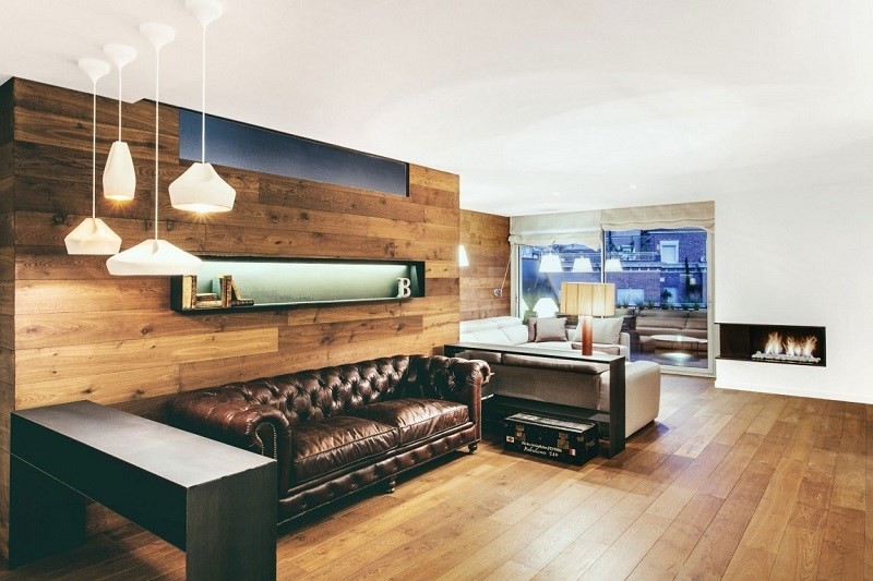 dos espacios para descanso en el salón amplio decoración de salones dos seciones sofa cuero ideas