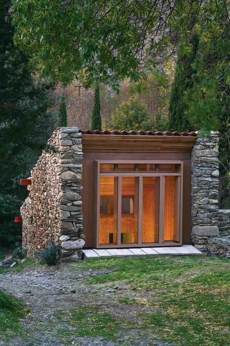 diseño casa cueva piedrta madera