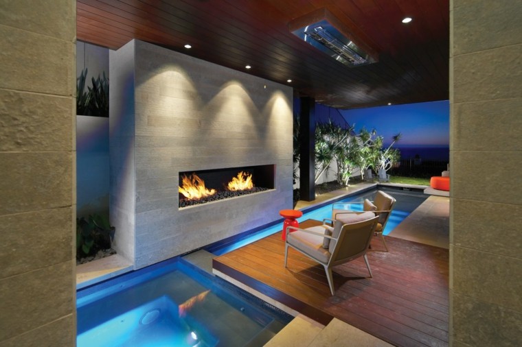 piscina cubierta chimenea moderna