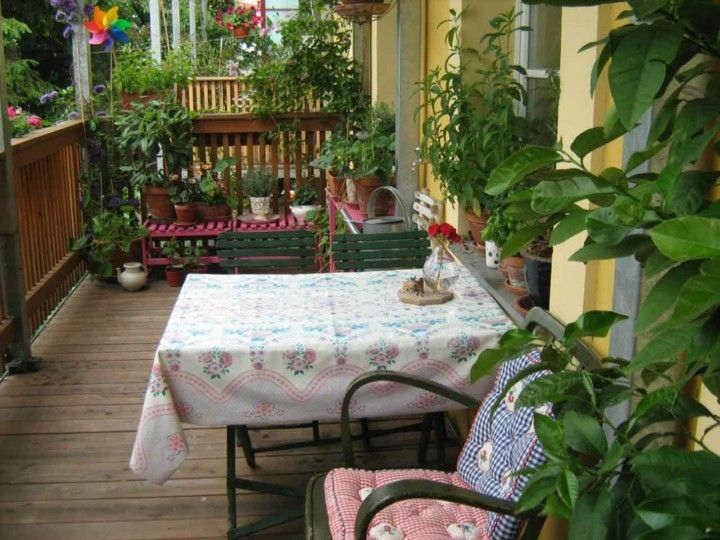 decorar terrazas mesa plantas