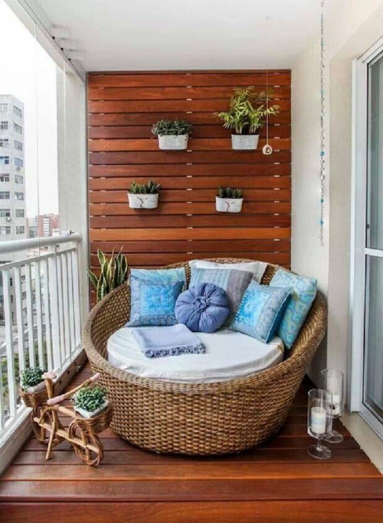 decoración terraza nido mimbre