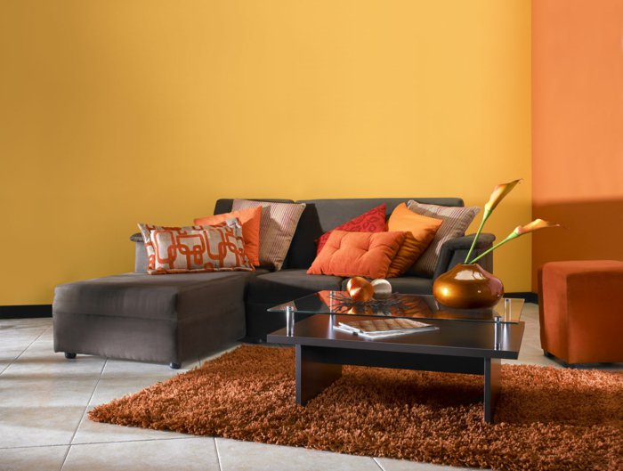 muebles grises detalles decorado naranja paredes